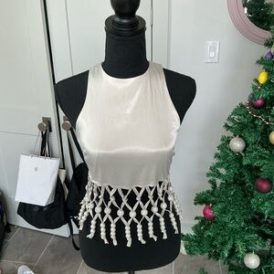 Elegant Cream Sleeveless Top with Fringe